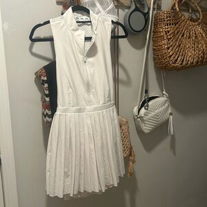 Pleated  white tennis dress purchased from Target. Special colab with Prince.